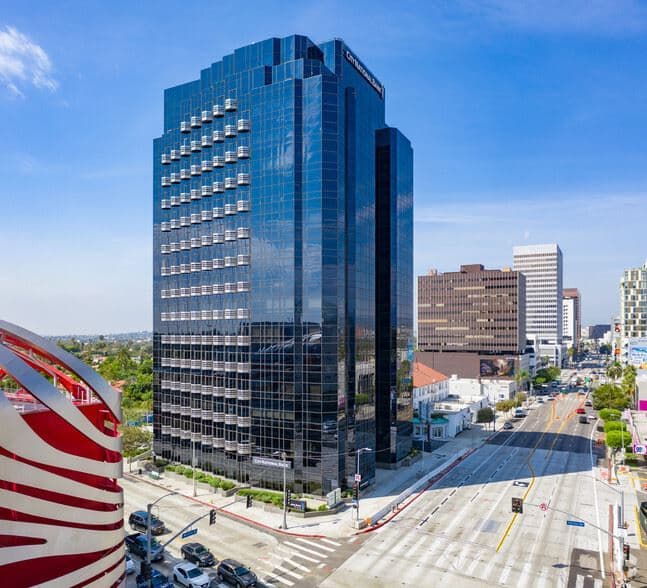 The dark glass tower at 6100 Wilshire, on Museum Row